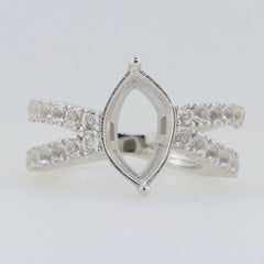 Sterling silver semi mount ring setting with halo and moissanite accents, marquise shape and split shank design.