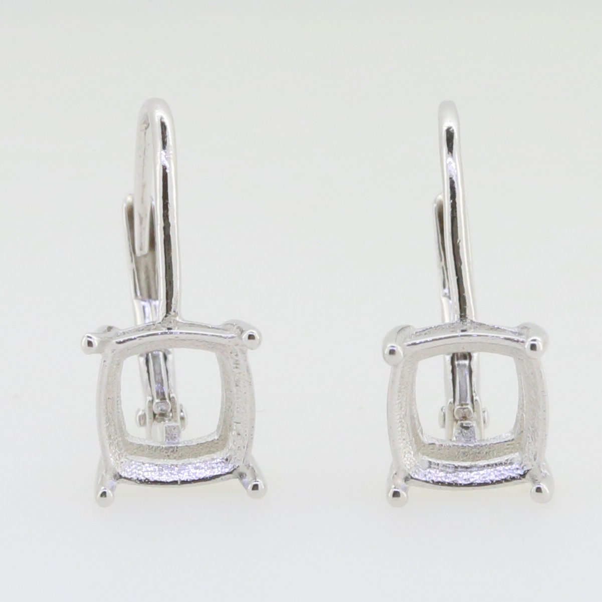 Custom sterling silver semi mount earrings setting with dangle leverback, designed for 8x7mm gemstones.