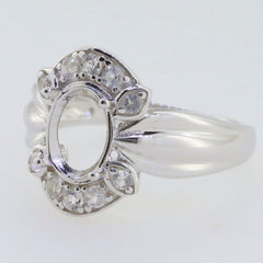 Sterling silver semi mount ring setting with oval halo and moissanite accent stones, designed for custom gemstones.