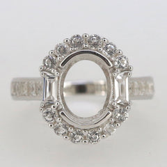 Sterling silver semi mount ring setting featuring oval 10x8mm and baguette halo design, ideal for custom gemstone placement.