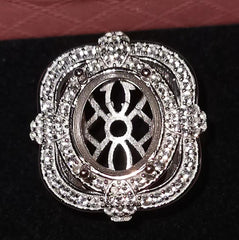 Sterling silver semi mount ring setting with intricate design, ideal for 12x10mm oval gemstone.