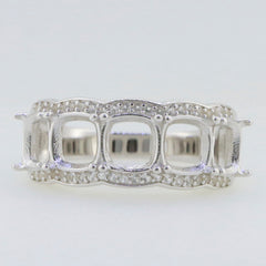 Sterling silver semi mount ring setting with cushion-shaped stone placement and intricate band design.