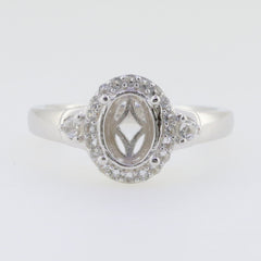 Sterling silver semi mount ring setting with oval 8x6mm design and D color moissanite accent stones.