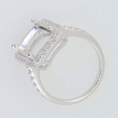 Sterling Silver semi mount ring setting with halo design, ready for emerald and D Color Moissanite accents.
