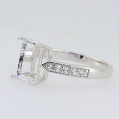 Sterling silver semi mount ring setting with D color moissanite accents and space for a 10x8mm emerald.