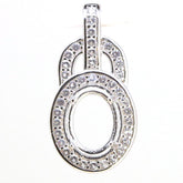Sterling silver oval semi mount pendant setting with halo of D color moissanite, designed for custom gemstone sizing.