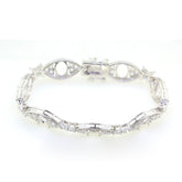 Sterling silver semi mount tennis bracelet setting with white topaz accent, showcasing elegant design and craftsmanship.
