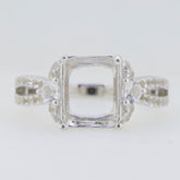 Sterling silver semi mount ring setting with moissanite accents and halo design, ideal for emerald gem placement.