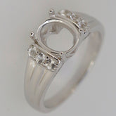 Sterling Silver semi mount ring setting with oval halo, D color moissanite accents, made to order gemstone jewelry.