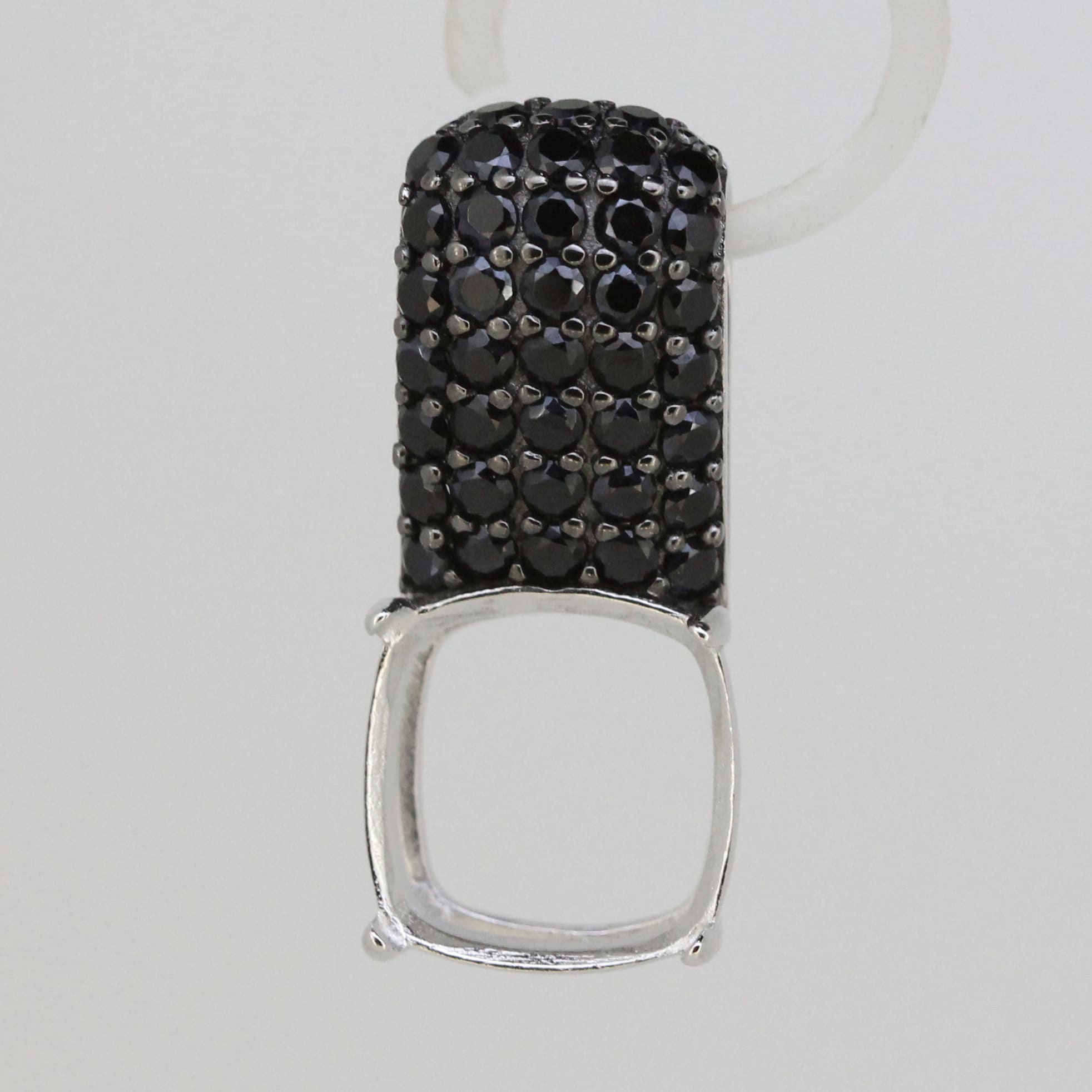 Sterling Silver semi mount pendant setting with black spinel and a cushion space for a 12x12mm gemstone.