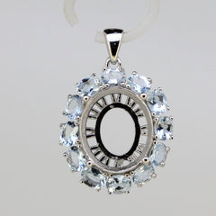 Sterling silver semi mount pendant setting with oval halo design and aquamarine gemstones, handmade to order.