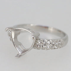 Sterling Silver semi mount ring setting with moissanite accent, designed for a 10x10mm trillion gemstone.
