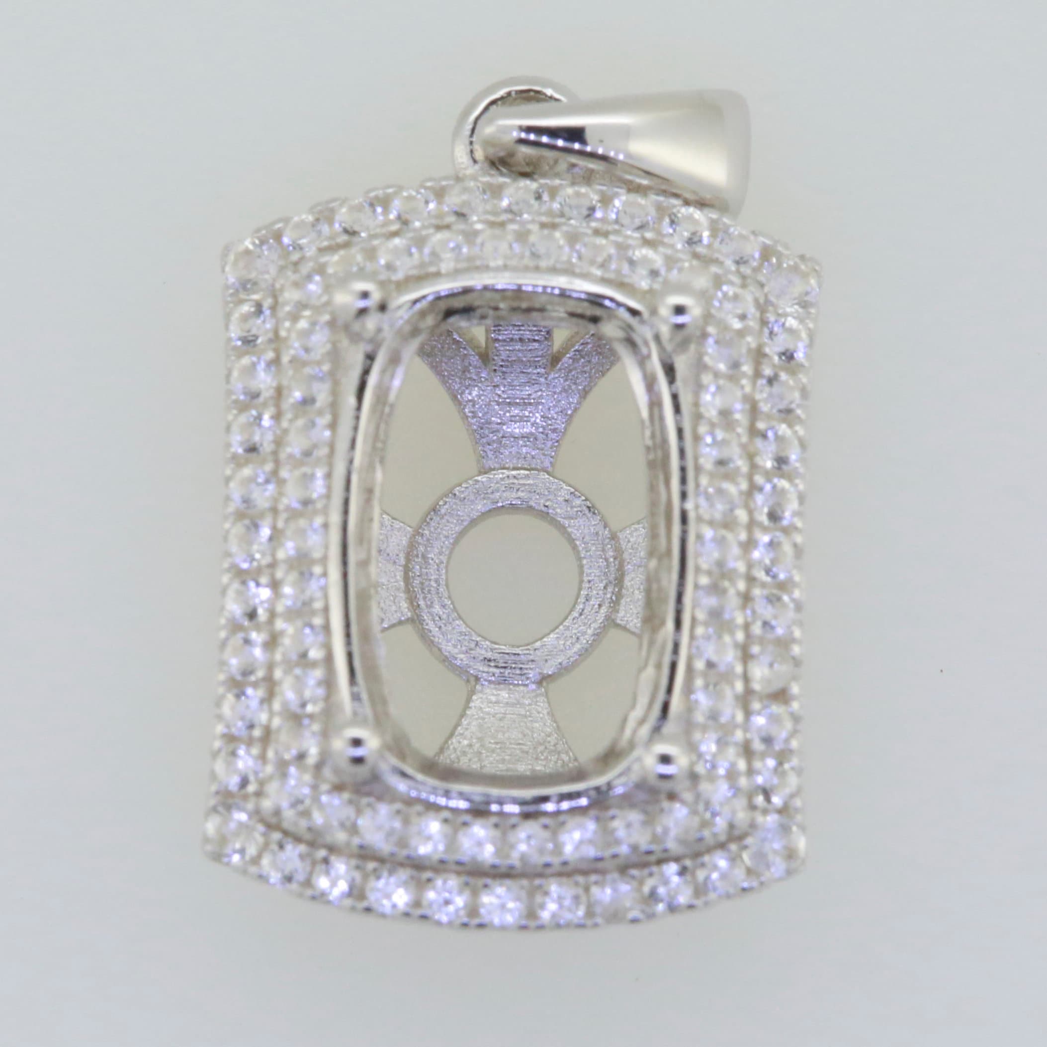 Sterling silver semi mount pendant setting with halo of white topaz for customizable gemstone options.