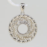 Sterling silver semi mount pendant setting featuring a round halo design with white topaz accents, designed for custom gemstones.