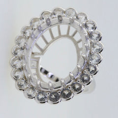 Sterling Silver semi mount ring setting with white topaz halo, designed for custom oval stone placement.
