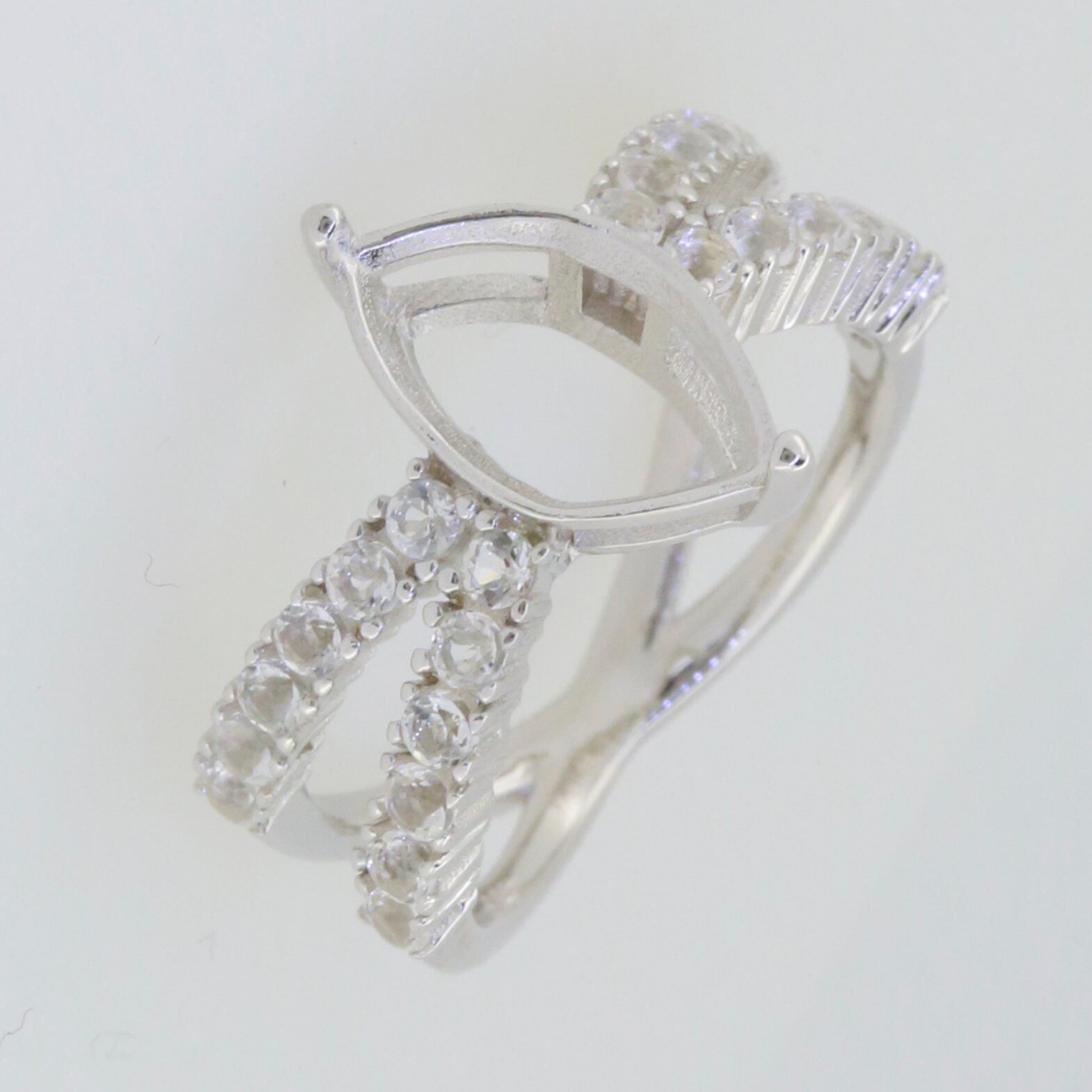 Sterling silver semi mount ring setting with marquise halo and moissanite accents, ideal for custom gemstone rings.