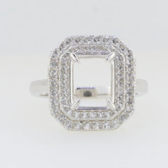 Sterling silver semi mount ring setting with white topaz accents, featuring an emerald cut design.