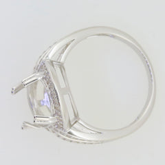 Sterling silver semi mount oval ring setting for cabochon with halo design, prepared to order, showing empty gemstone setting.