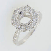 Sterling silver semi mount ring setting featuring an 8x8mm round halo with moissanite accents, ready for customization.