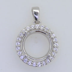Sterling silver semi mount pendant setting with white topaz halo, round 13x13mm for custom gemstone placement.