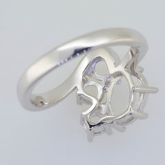 Sterling Silver semi mount ring setting for 9x7mm oval gemstone, showcasing bypass design and White Topaz.