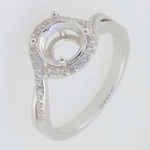 Sterling silver semi mount ring setting featuring moissanite accents and a round 8x8mm halo design.