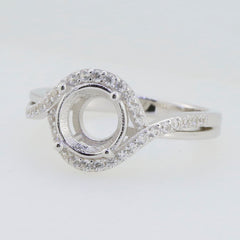 Sterling silver semi mount ring setting with halo and moissanite accents, designed for 8x8mm round gemstone.