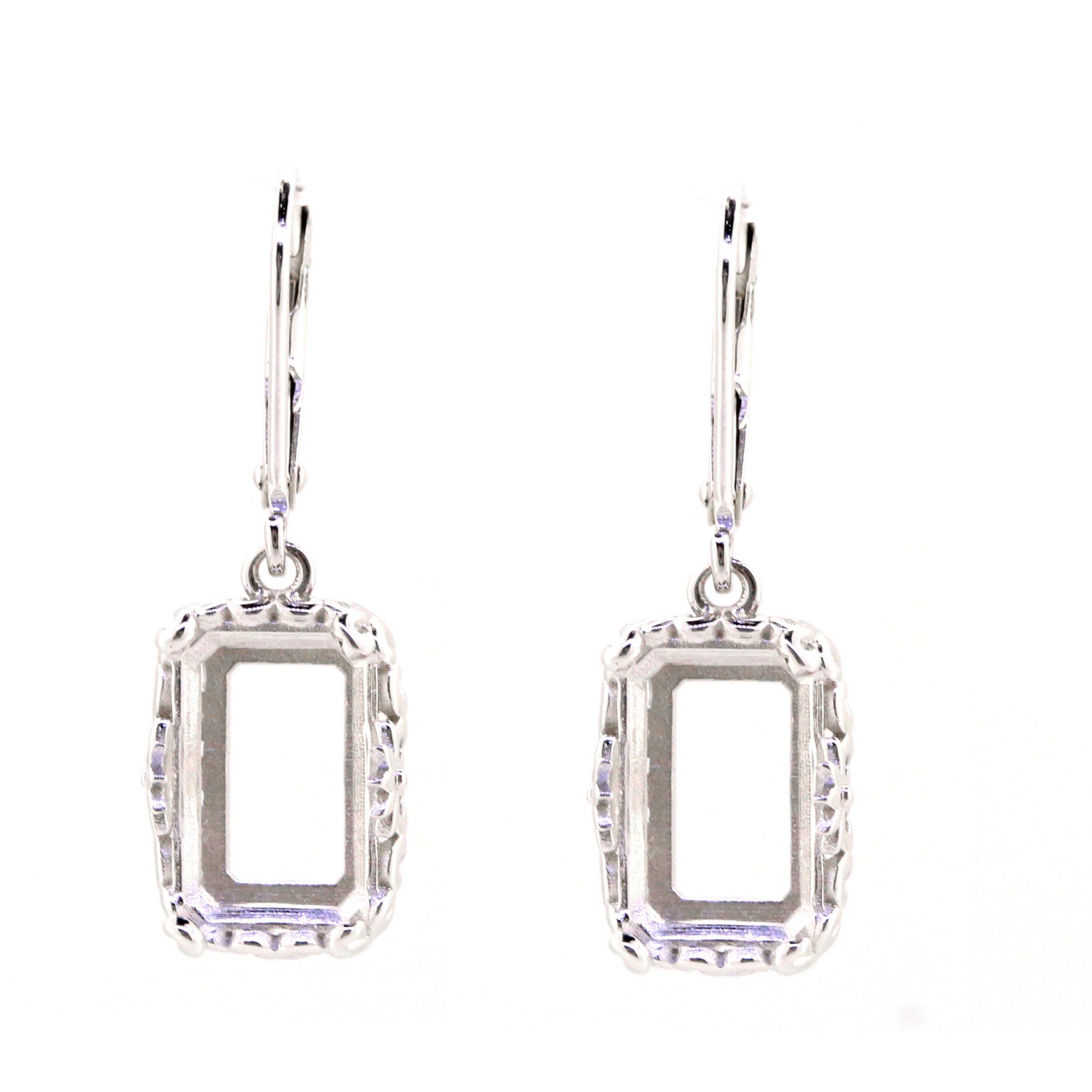 Custom sterling silver semi mount earrings setting with intricate Art Nouveau design, ready for gemstone placement.