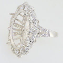 Sterling silver semi mount ring setting with halo and moissanite accents, designed for custom oval stone.