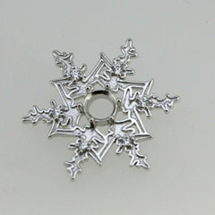 Sterling silver semi mount pendant setting in snowflake design with round moissanite stones.