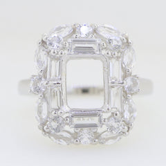 Sterling silver semi mount ring setting with emerald-shaped and marquise diamond accents in double halo design.