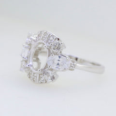 Sterling Silver Semi Mount Ring Setting for 9x7mm oval gemstone with White Topaz accents.