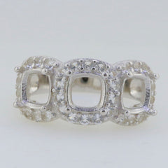Sterling silver semi mount ring setting with cushion cut moissanite, featuring a 3 stone halo design.