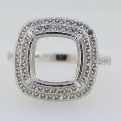 Sterling silver semi mount ring setting with double halo and white topaz accents, cushion shape for a main gemstone.