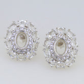 Sterling silver semi mount earrings setting with white topaz in double halo design, oval shape 6x4mm.