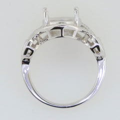 Sterling silver semi mount ring setting with oval halo for 12x10mm stone, featuring white topaz accents on cross shank.