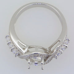 Sterling Silver semi mount ring setting with twisted shank and white topaz gemstones, designed for an oval stone.