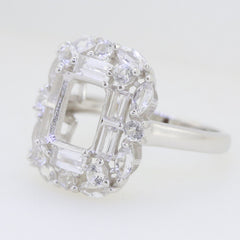 Sterling silver semi mount ring setting with emerald, baguette, and marquise double halo design.