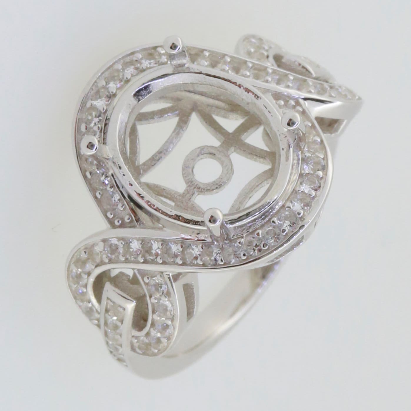 Sterling Silver Semi Mount Ring Setting with White Topaz Halo and Cross Shank, showcasing intricate design and gemstone accents.