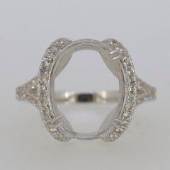 Sterling Silver semi mount ring setting with white topaz halo for oval gemstone. Customizable sizes available.
