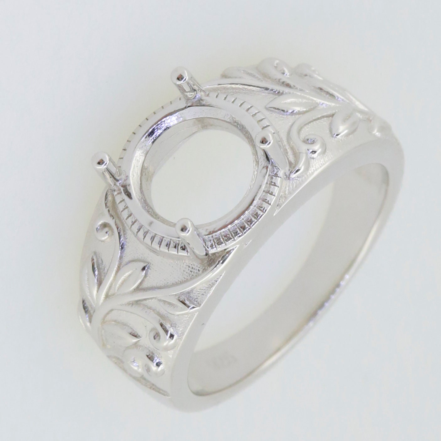 Sterling silver semi mount ring setting with art nouveau design, featuring a round 9x9mm gemstone holder.