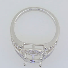 Sterling silver semi mount ring setting with moissanite accents, designed for an oval gem 10x8mm, split shank style.