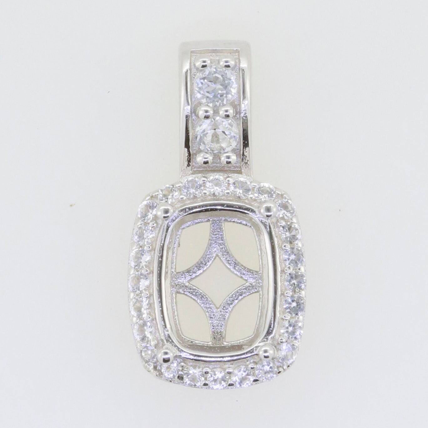 Sterling silver semi mount pendant setting with cushion halo and white topaz, customizable size for personalized jewelry.