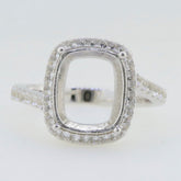 Sterling silver semi mount ring setting with cushion shape for a 12x10mm gemstone, featuring white topaz accents.