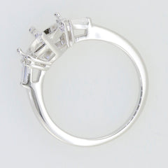 Sterling silver semi mount ring setting with oval space for 10x8mm gemstone and baguette accent stones.