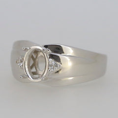 Sterling silver semi mount ring setting with oval gemstone holder and moissanite accents.