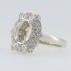 Sterling silver semi mount ring setting with oval halo floral design, made to order for custom gemstone fitting.