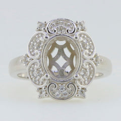 Sterling Silver Semi Mount Ring Setting with Oval Halo Floral Design, customizable for various gemstone sizes.