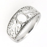 Sterling silver semi mount ring setting with filigree design, featuring an oval center and topaz accents.