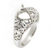 Art Deco style sterling silver semi mount ring setting for 7x5mm pear stone, adorned with white topaz side stones.